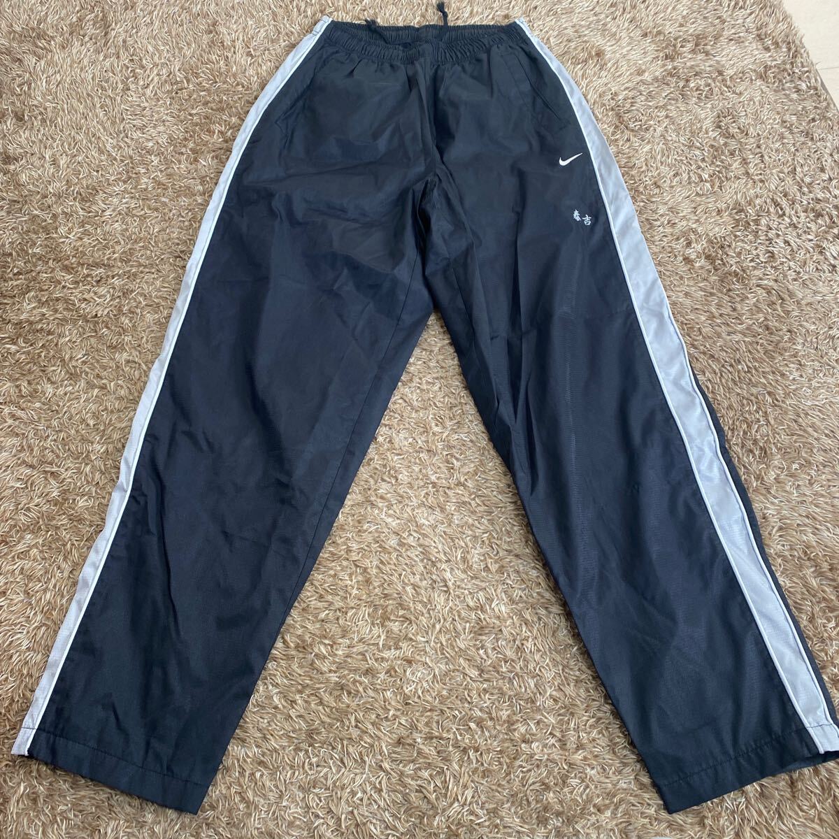 t79 NIKE スポーツパンツ サイズM表記 中国製拍卖