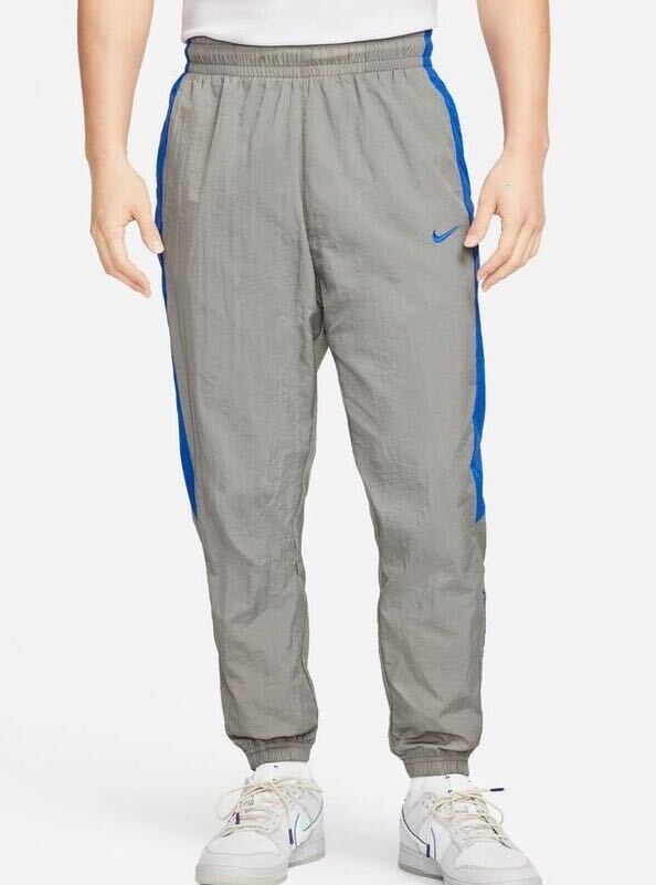 新品 送料込 NIKE NSW CF CB I2SP WOVEN PANTS Sサイズ 灰/青 ナイキ ウーブン パンツ ナイロン ルーズフィット テーパード トレーニング拍卖