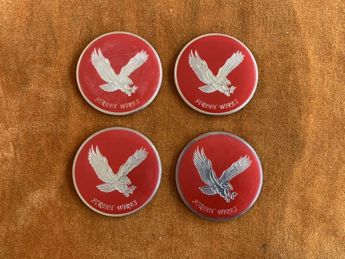 ストリートワイヤーエンブレム4枚セット。レッド ワイヤーホイールエンブレム ノックオフエンブレム デイトンインパラベルエア拍卖