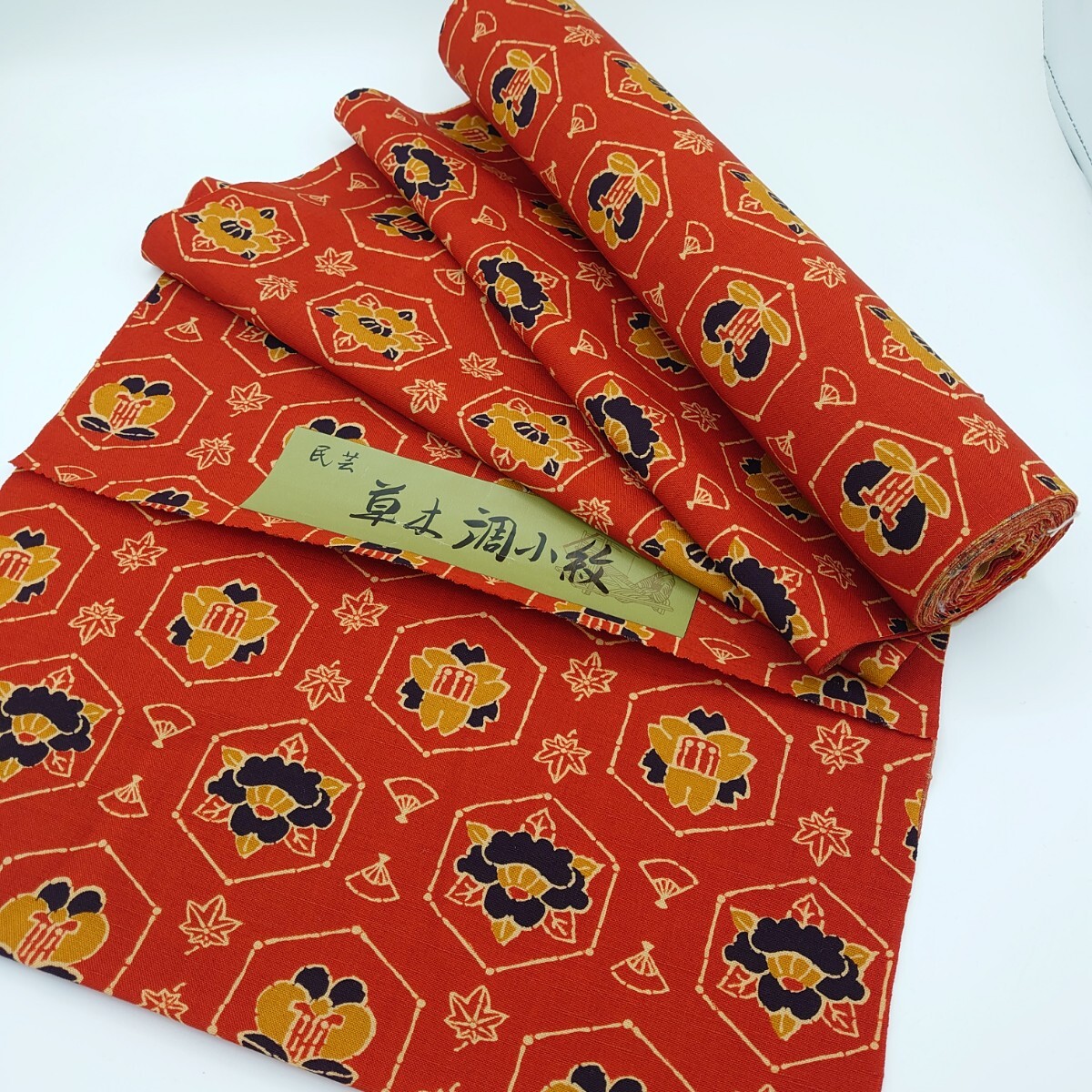 558【未使用保管品】 民芸 草木調小紋 未仕立て品 反物 一反×37cm オレンジ 橙系亀甲花文 紅葉 扇模様 日本 アンティーク 着物 洋服拍卖