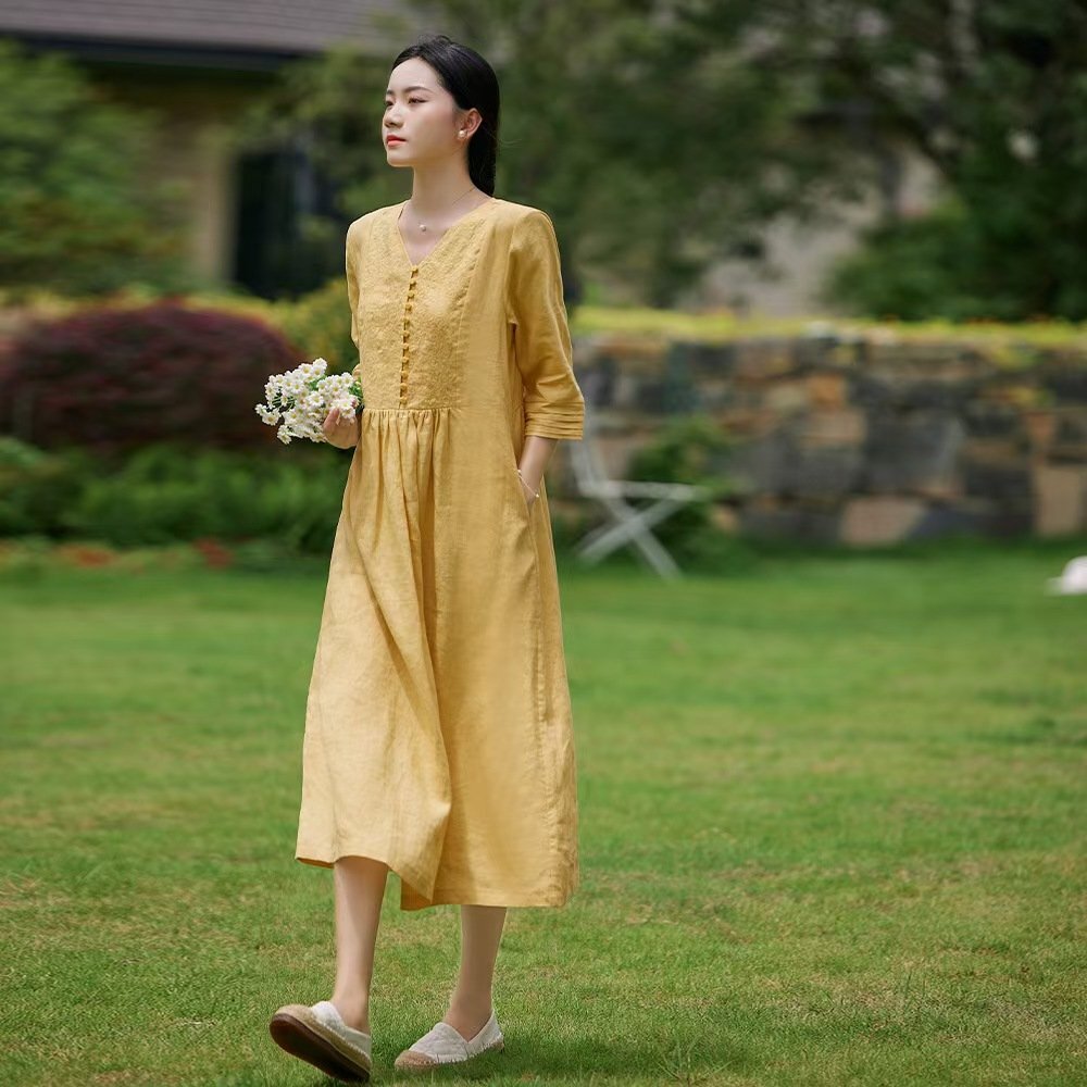 LRM1209★秋の服の新型のハイエンドのオリジナルの麻刺ワンピースVネック文芸純色の7分袖のゆったりとした大振り子の長スカート拍卖