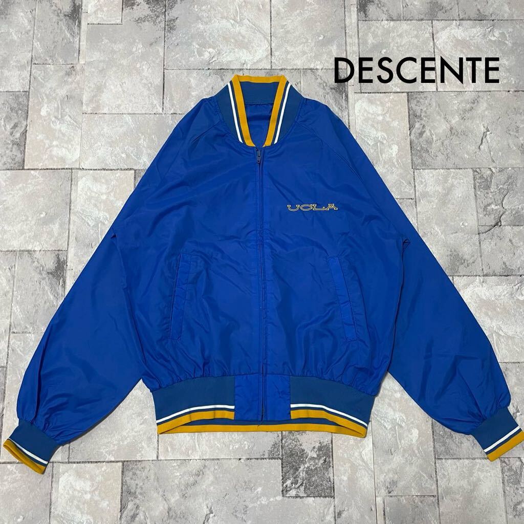 DESCENTE デサント UCLA ナイロンジャケット ジップアップ スタジャン リブライン 80s 90s ヴィンテージ カレッジロゴ ブルー 玉SS1796拍卖