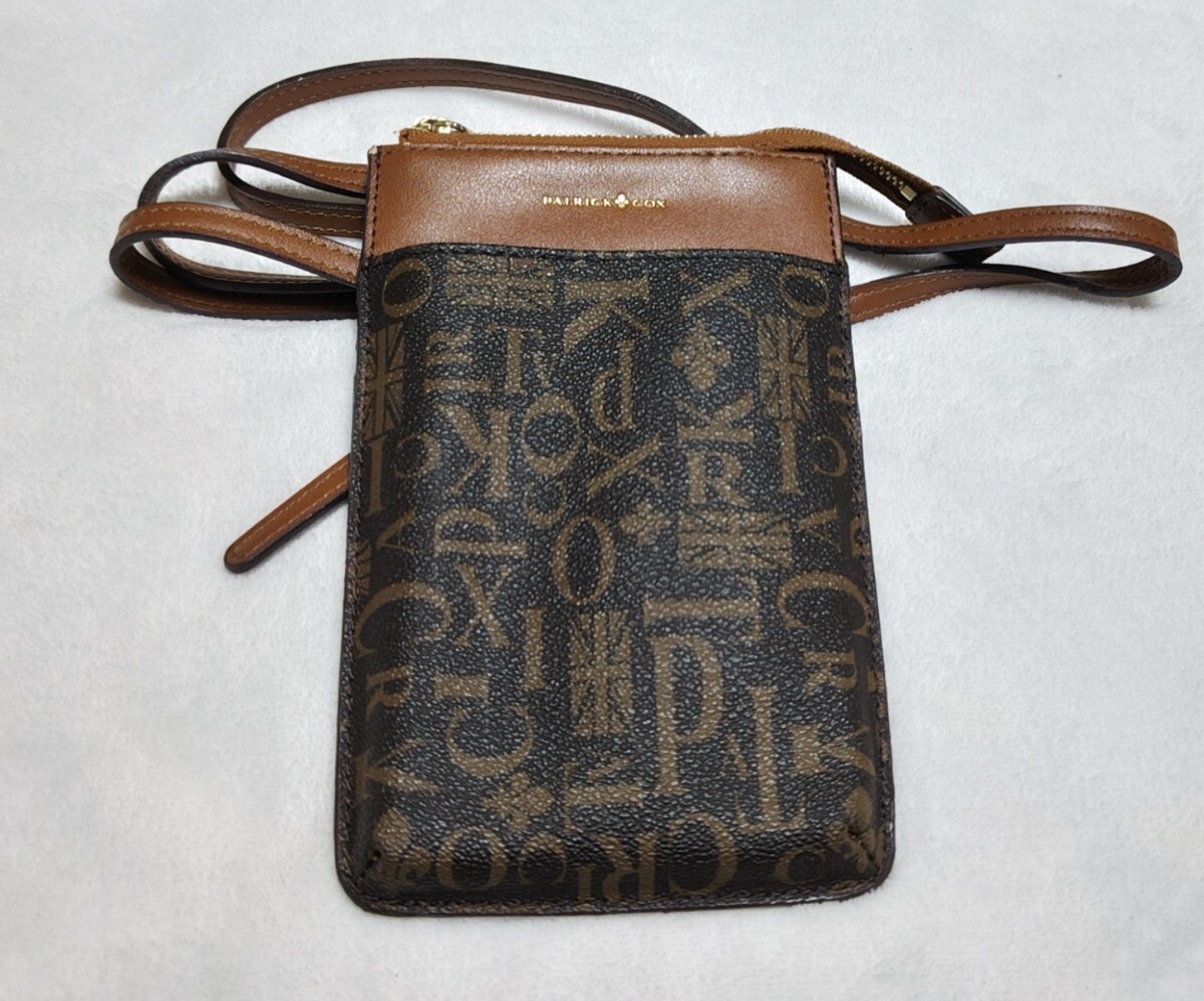 値下げ♪Patrick Cox♪ショルダーポーチ♪ポーチ♪ブラウン♪携帯ポーチ♪内側はピンク系♪パトリック・コックス♪拍卖
