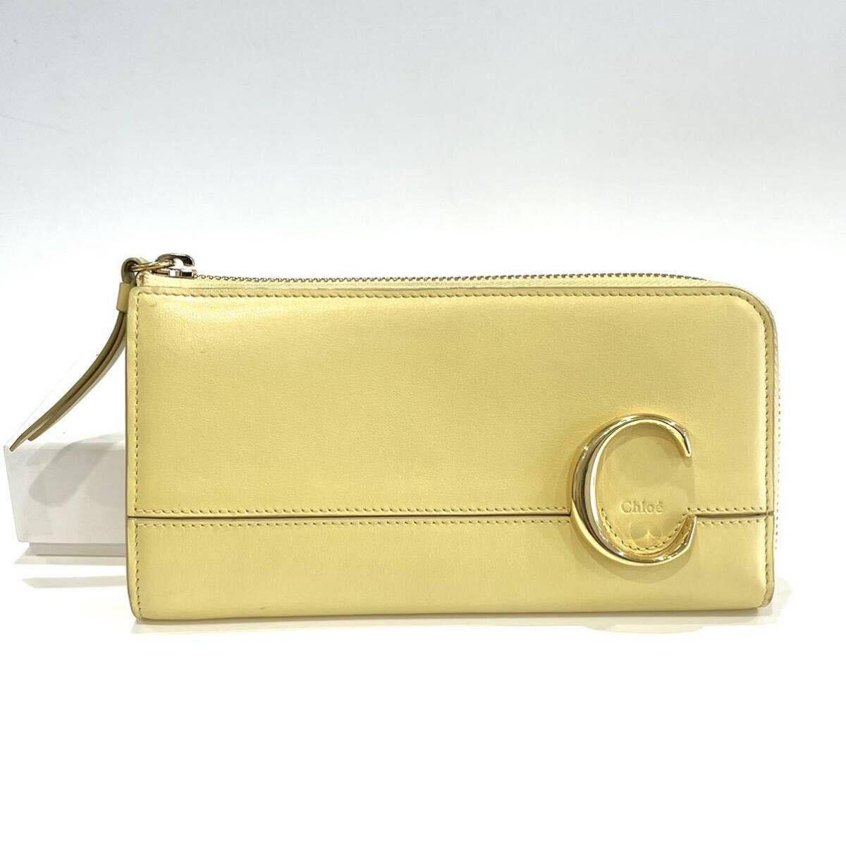 良品 Chloe クロエ CHC19WP084A37 ラウンドファスナーウォレット Cロゴ L字ファスナー 長財布 レザー イエロー レディース 専用袋 箱保証書拍卖