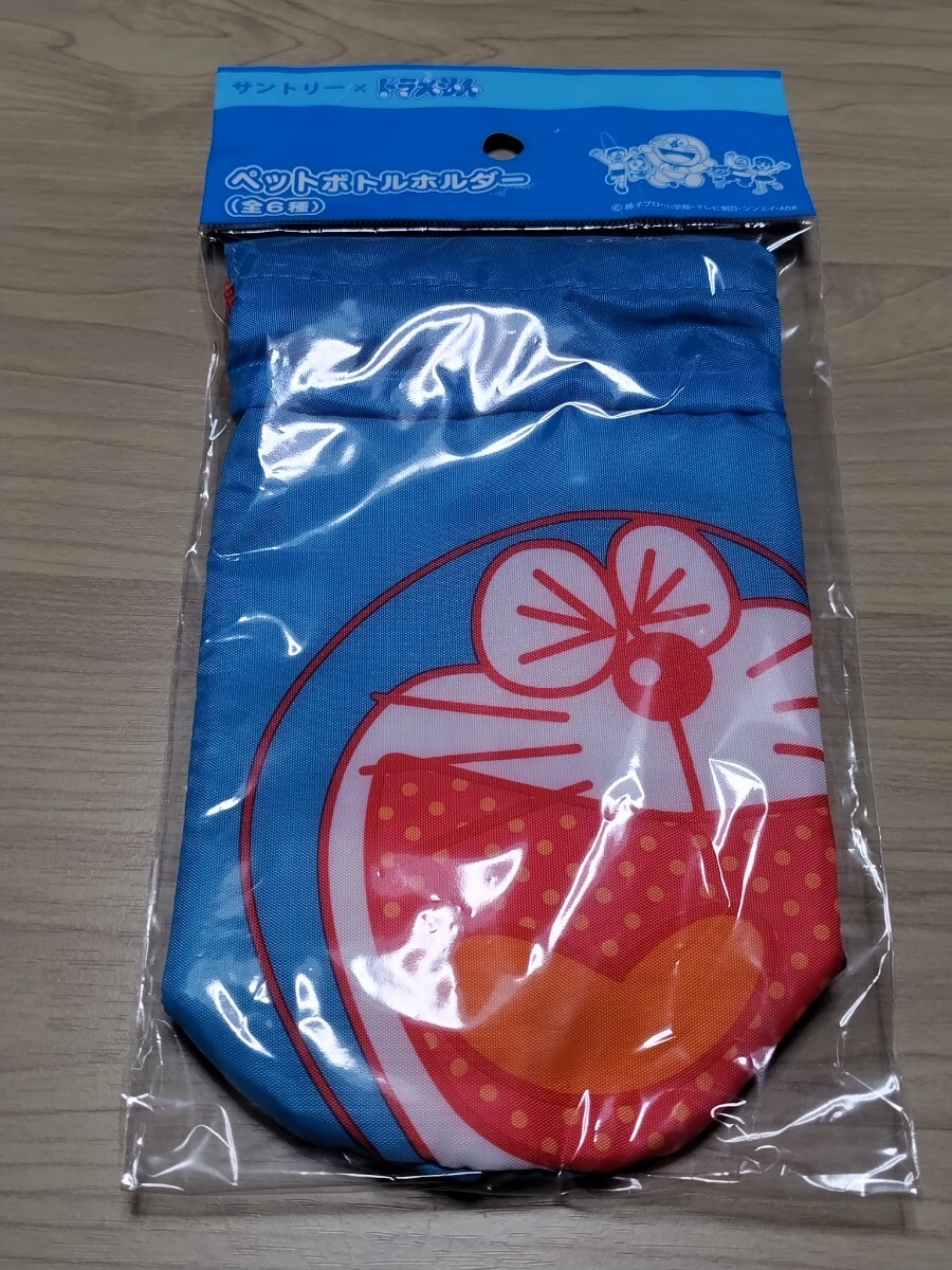 Y1570 : サントリー × ドラえもん ペットボトルホルダー 新品未使用拍卖