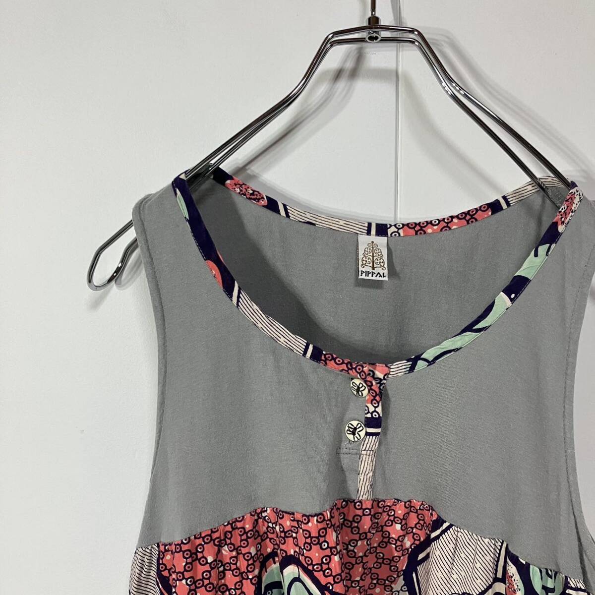 古着 切替 ニット 布帛 巻貝 パターン柄 デザイン ボタン 前後アシンメトリー ノースリーブ フレア ひざ丈 ワンピース拍卖