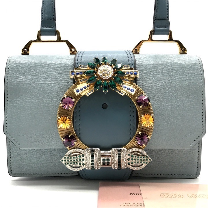 良品 miumiu ミュウミュウ ショルダー バッグ クリスタル ビジュー マドラスレザー 水色 レディース k3021拍卖