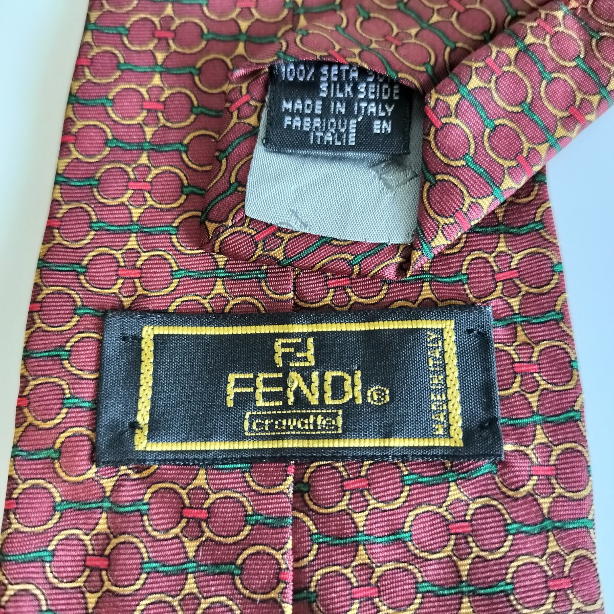 FENDI(フェンディ)ボルドー赤緑ゴールド丸ネクタイ拍卖