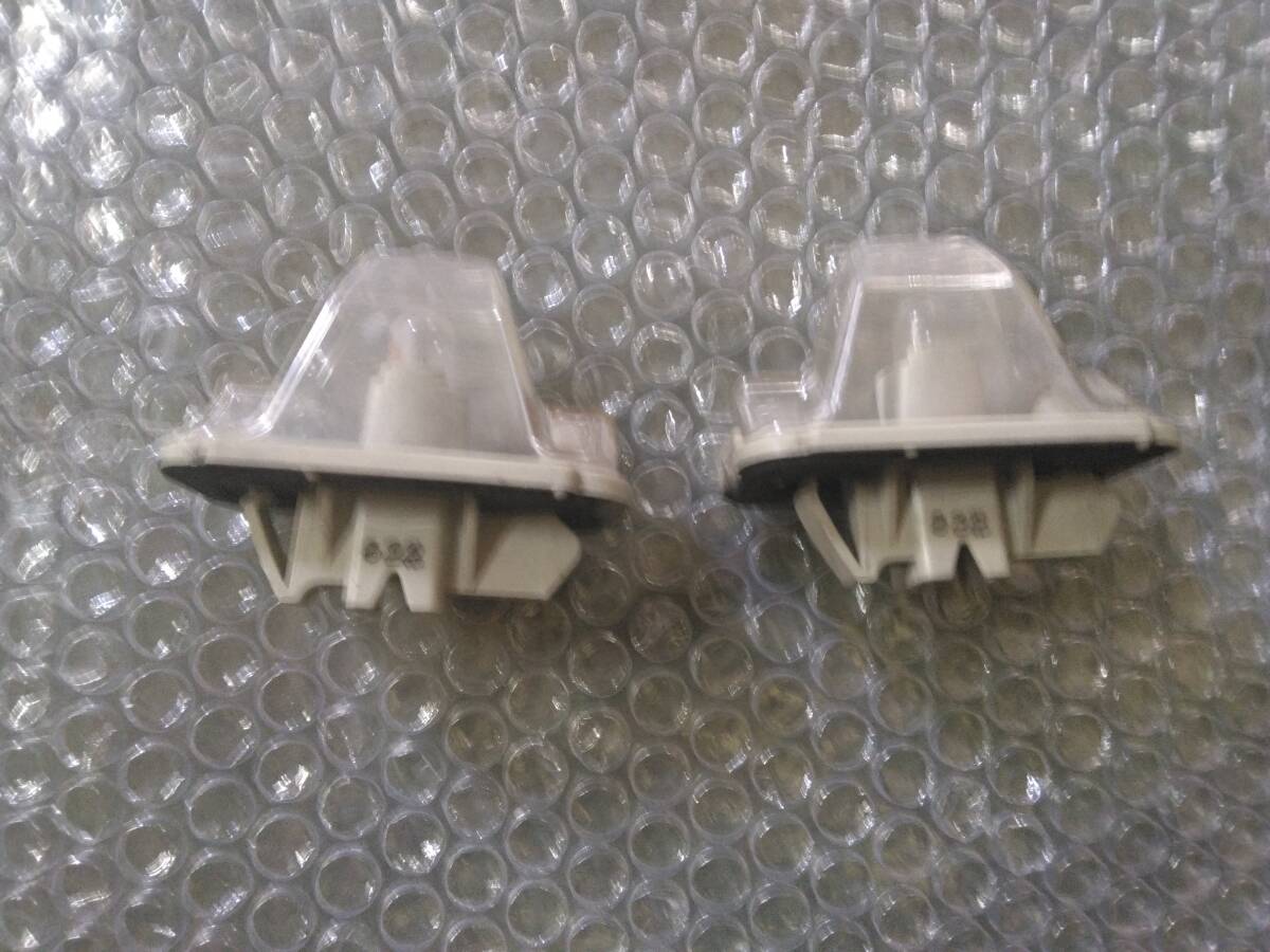 ダイハツ ミラジーノ L650S 純正ライセンスランプ 2個セット ナンバー灯 ミニライト拍卖