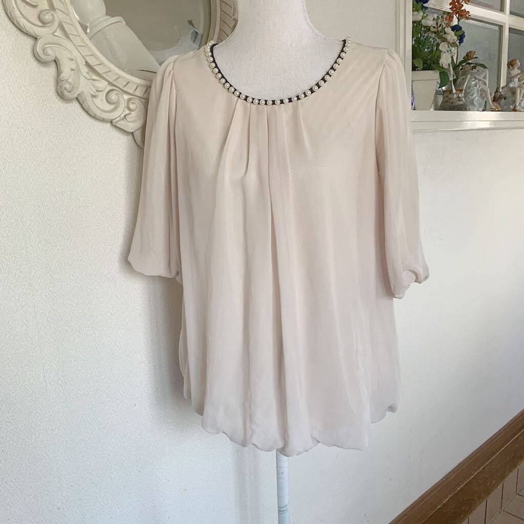 Jinarissa パール使い 後ろ可愛い チュニックブラウス フリル拍卖