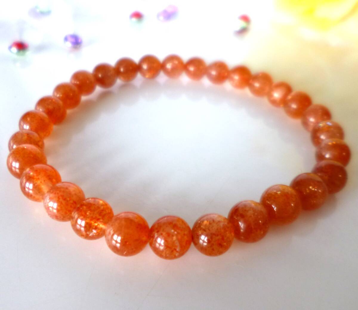 ☆生命エネルギー☆ポジティブストーン☆太陽の石☆勝利の石☆タンザニア産☆サンストーン☆6.5mm☆16cm☆6月22日の誕生日石☆拍卖