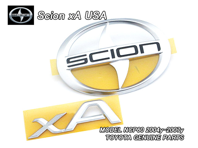 イストNCP60/SCION/サイオンxA純正USエンブレムセット-リア2点/USDM北米仕様USAトヨタiSt米国バックドア楕円シンボルマーク&文字バッジ拍卖
