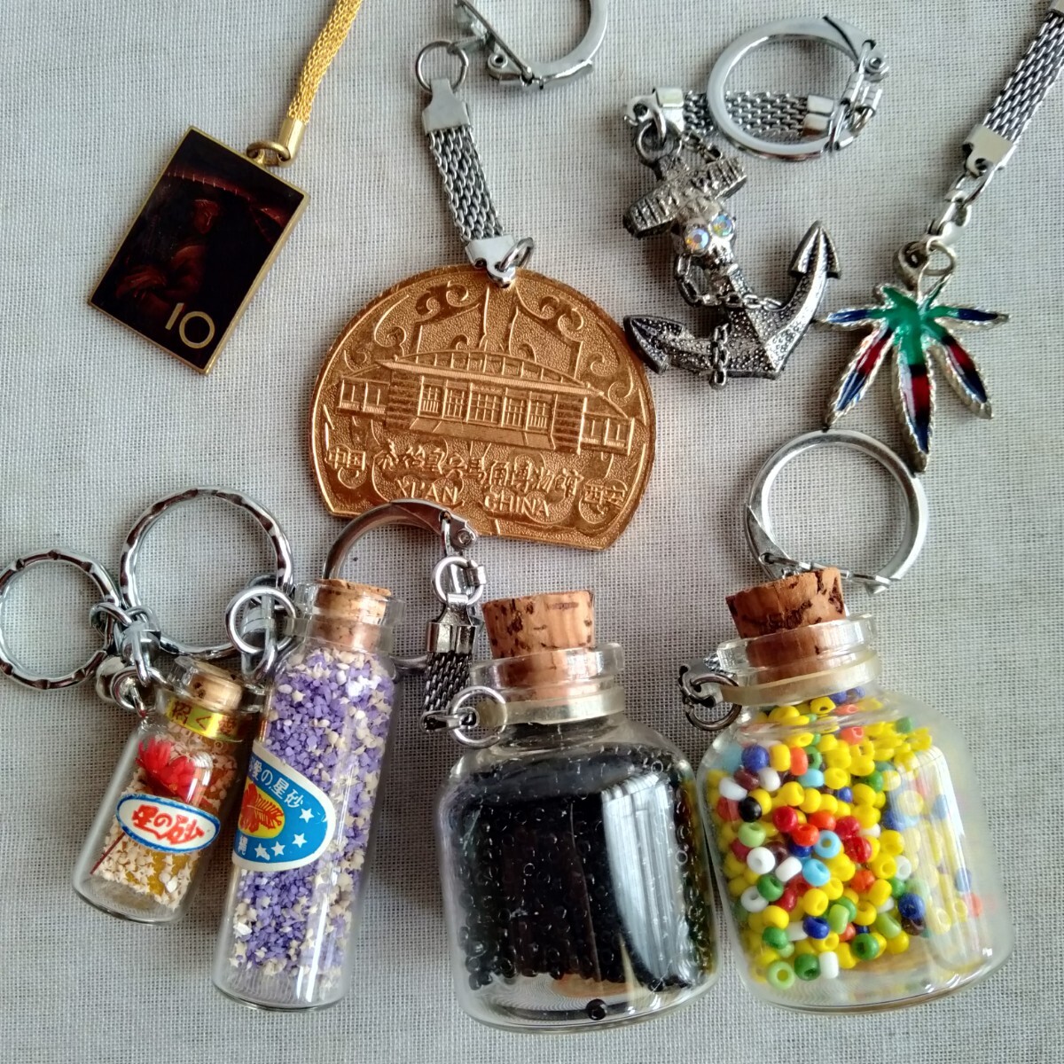 キーホルダー角72 中国 西安 イカリ 沖縄星の砂 ビーズ マリファナ葉っぱ風 お土産 郷土玩具 8点まとめて 平成 昭和 レトロ拍卖