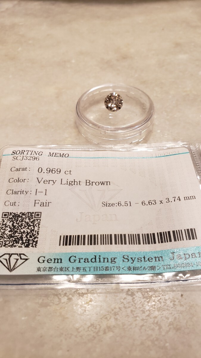 10クシン 天然ダイヤモンドルース 0.969カラット Very Light Brown ルース .I-1 Fair ソーティグ付き 照り良いダイヤモンド。 拍卖