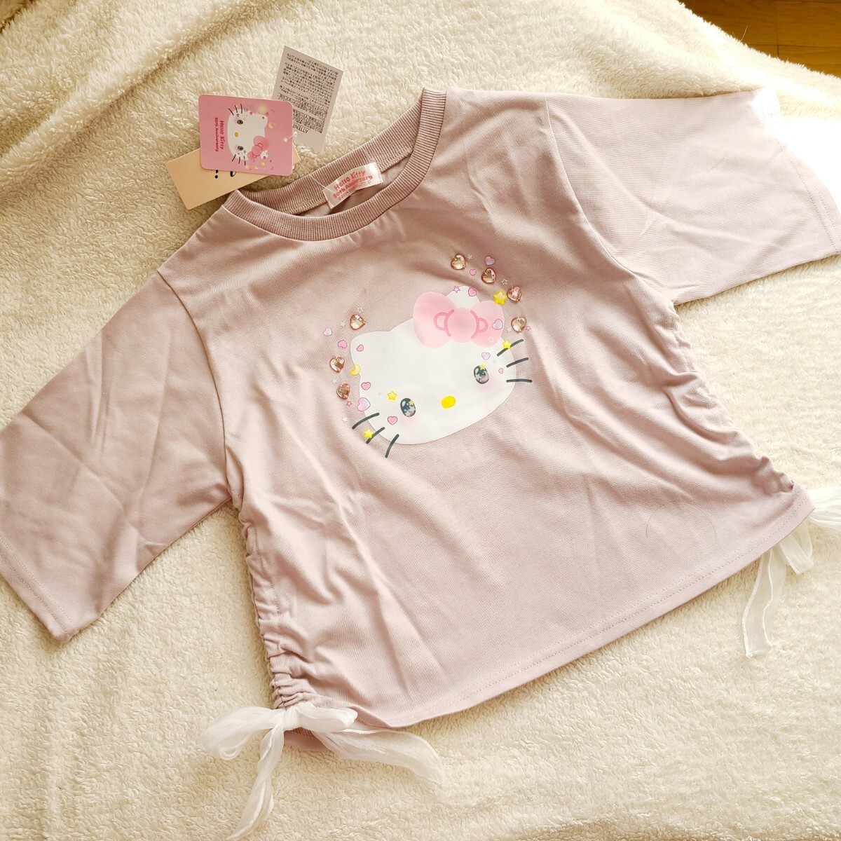 ★★★【サンリオ】キティ 裾シアーリボン Tシャツ Mサイズ 50th アイズシリーズ ピンク付 ストーン パシオス 50周年 2Z9361kR609拍卖