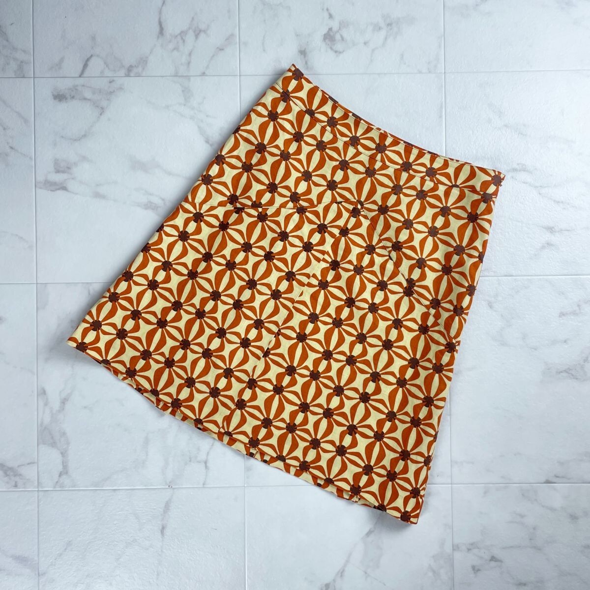 TRUSSARDI トラサルディ 総柄裾プリーツスカート サイドジップ 膝丈 裏地あり オレンジ系 サイズ40*SC1700拍卖