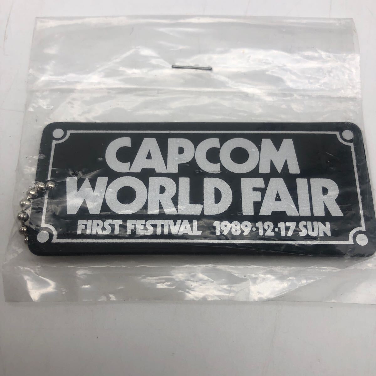 マニア向け 希少★CAPCOM キーホルダー WORLD FAIR FIRST FESTIVAL 1989.12.17 SUN◆未開封 当時物 カプコン イベント レア グッズ ゲーム拍卖
