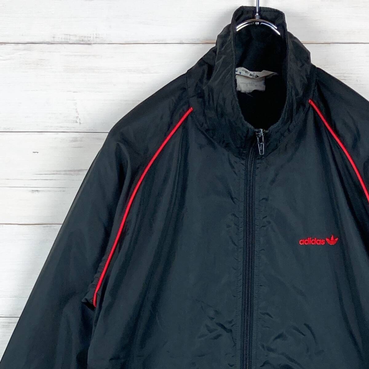 adidas アディダス ナイロンジャケット デサント製 裾調節コード ワンポイントロゴ刺繍 黒 赤 S A-75拍卖