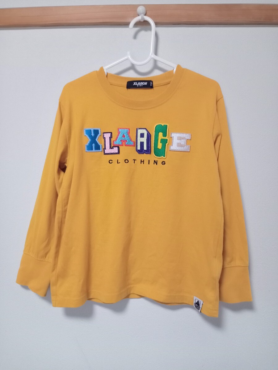 XLARGE KIDS(エクストララージ キッズ)マルチ カレッジ ロゴ ワッペン 長袖Tシャツ 120拍卖