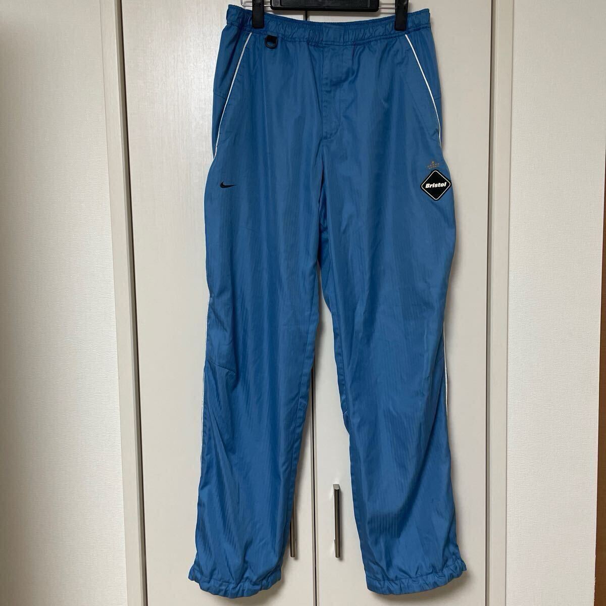 fcrb NIKE ナイロンパンツ トラッキングパンツ ★ シャカシャカパンツ ナイキ soph F C Real Bristol ウインドブレーカー ブルー 青 ソフ M拍卖