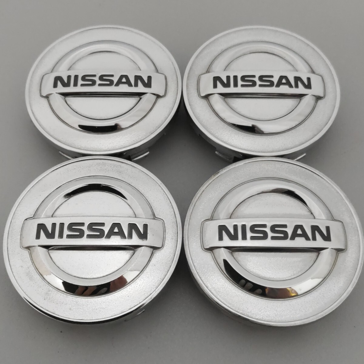 NISSAN ② 日産 センターキャップ ノート セレナ マーチ キューブ ジューク エルグランド エクストレイル スカイライン Z33 Z34 R33 R34拍卖