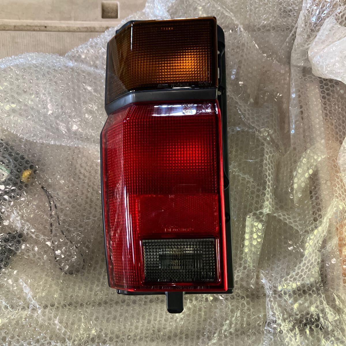 ラルゴ用 レンズコンビネーシヨンランプLHバネットラルゴ 26559-11C00 日産純正部品 新品未使用品拍卖