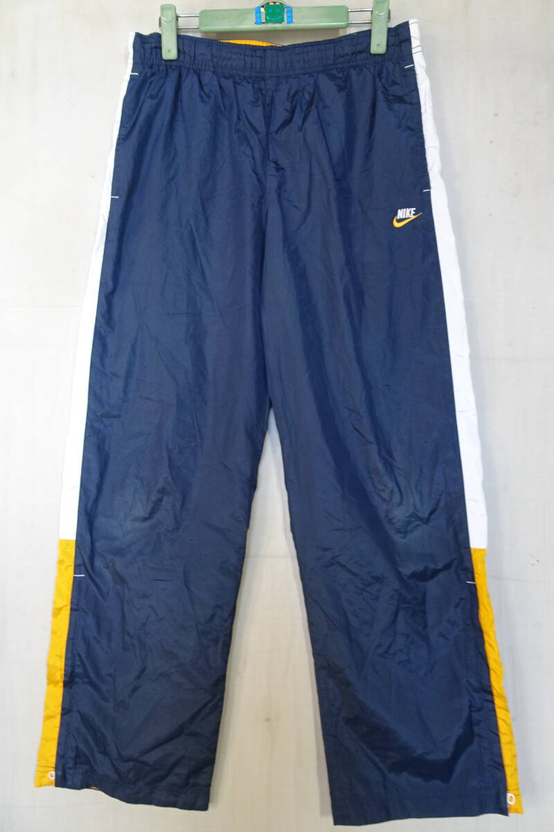 NIKE/ナイキ/ジュニア/ナイロン系長パンツ/ウォームアップ/スポーツ/脇白黄切替配色/裾ファスナー/紺/ネイビー/Lサイズ/160サイズ(12/5R)拍卖