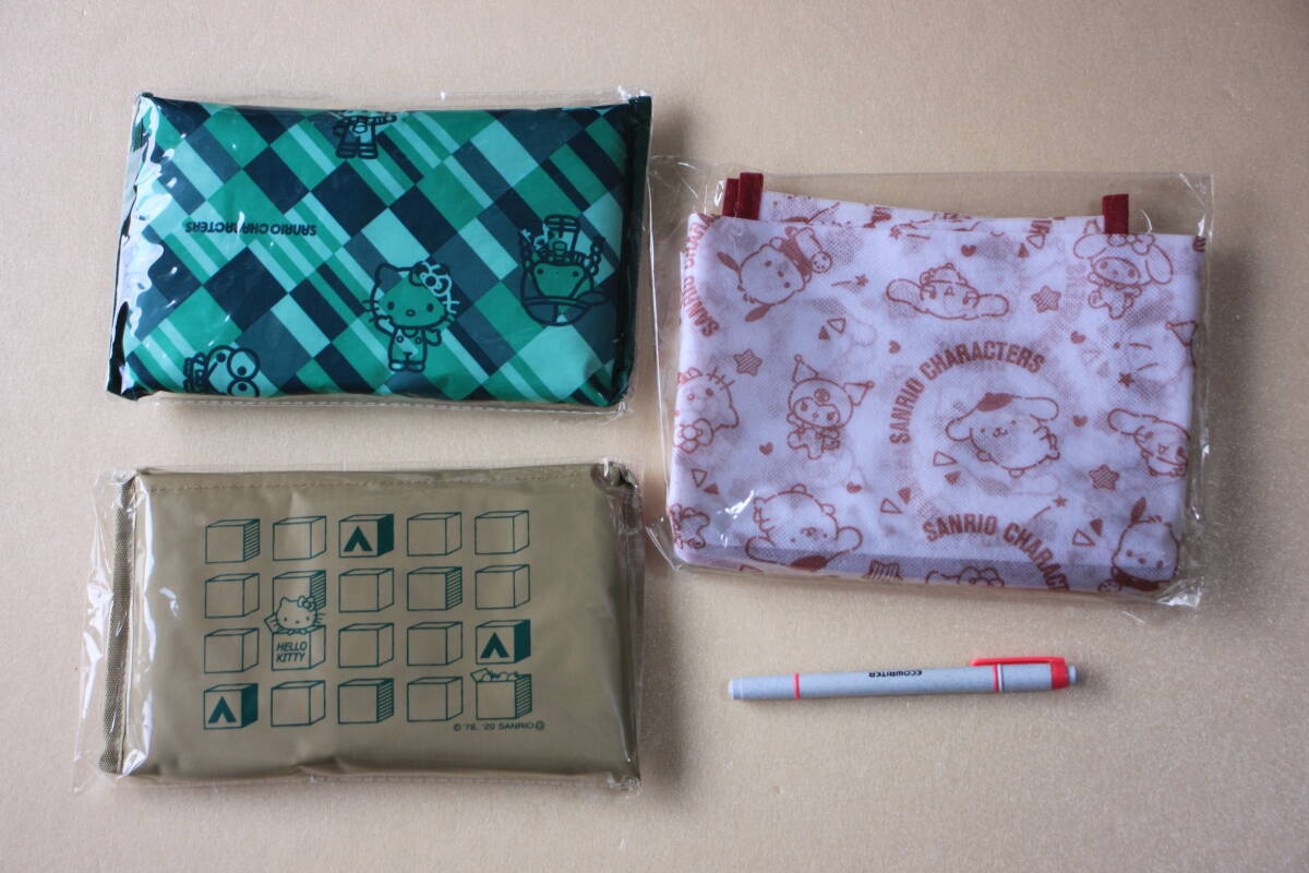28-15 ▲ハローキティ▲「パッカブルマイバッグ」「衣類収納袋」《洋服の青山》拍卖