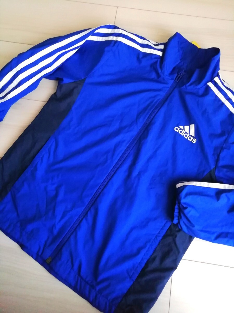 ナイロンジャンパー アディダス 140cm 青 裏起毛 子供服 ウィンドブレーカー拍卖