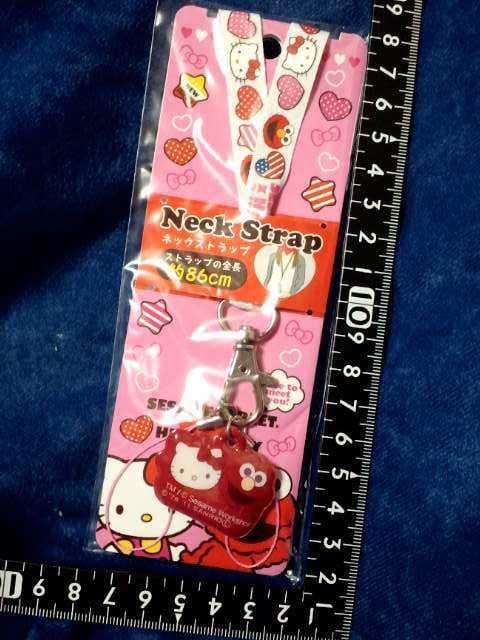 超素敵☆ハローキティ☆セサミのエルモちゃんの戯れ☆ネックストラップ☆ホワイト☆拍卖
