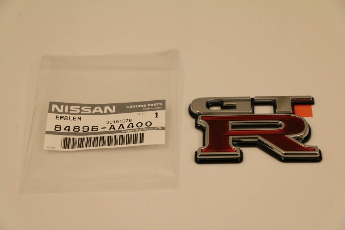 BNR34 スカイラインGT-R リアエンブレム 日産純正 84896-AA400 新品未使用 即納在庫有り V-spec N34-10拍卖