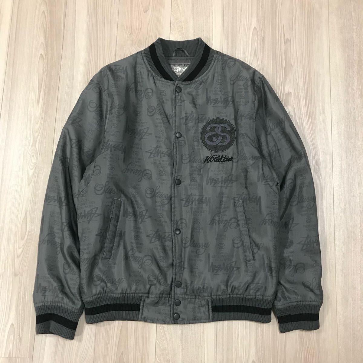 STUSSY AUTHENTIC GEAR WORLD TOUR THERMOLITE ステューシー スタジャン スタジアム ジャケット モノグラム 総柄 ブルゾン ビンテージ 