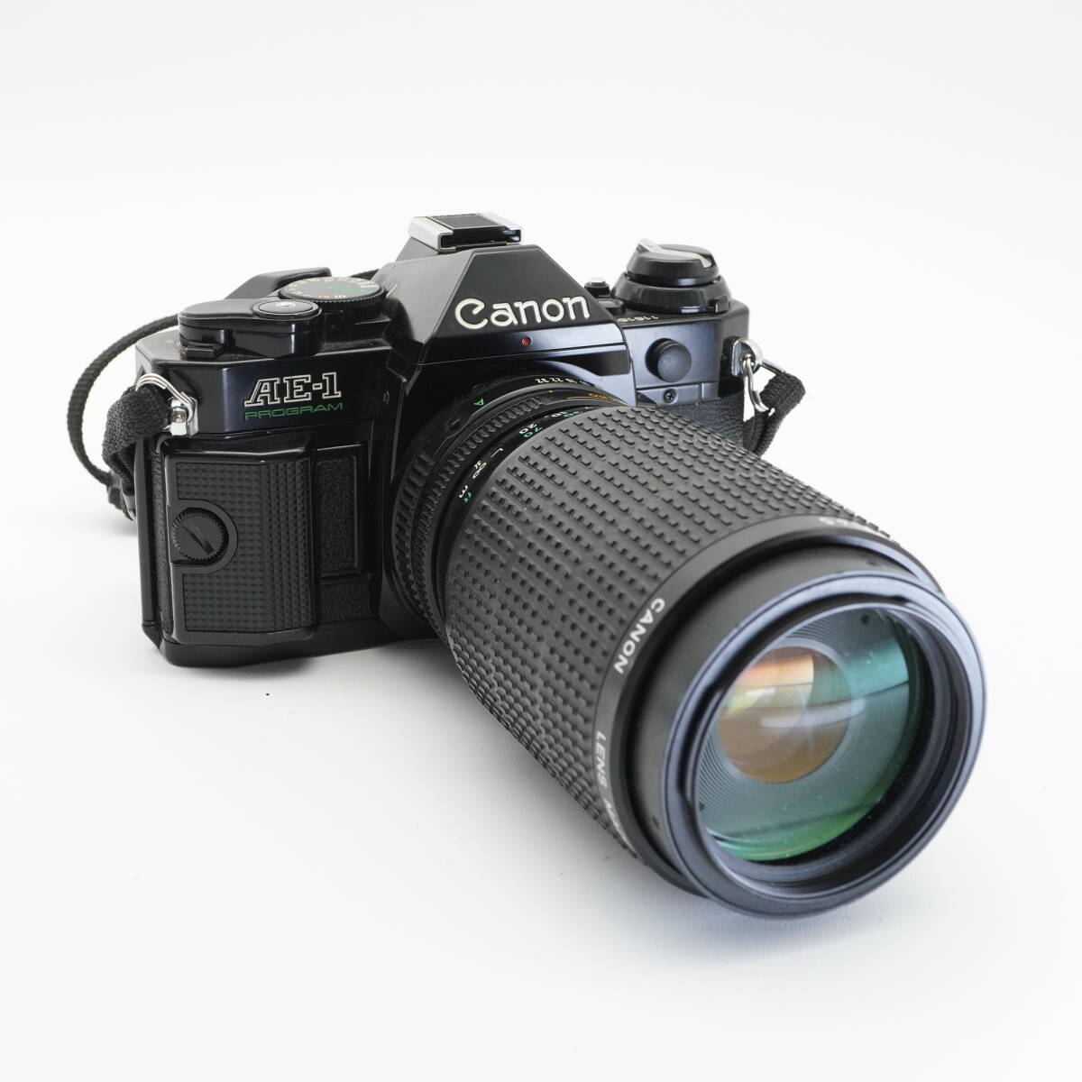 良品 Canon キヤノン AE-1 PROGRAM (シャッターOK 露出NG) NEW FD 75-200mm F4.5 フィルム一眼レフカメラ #AA5198