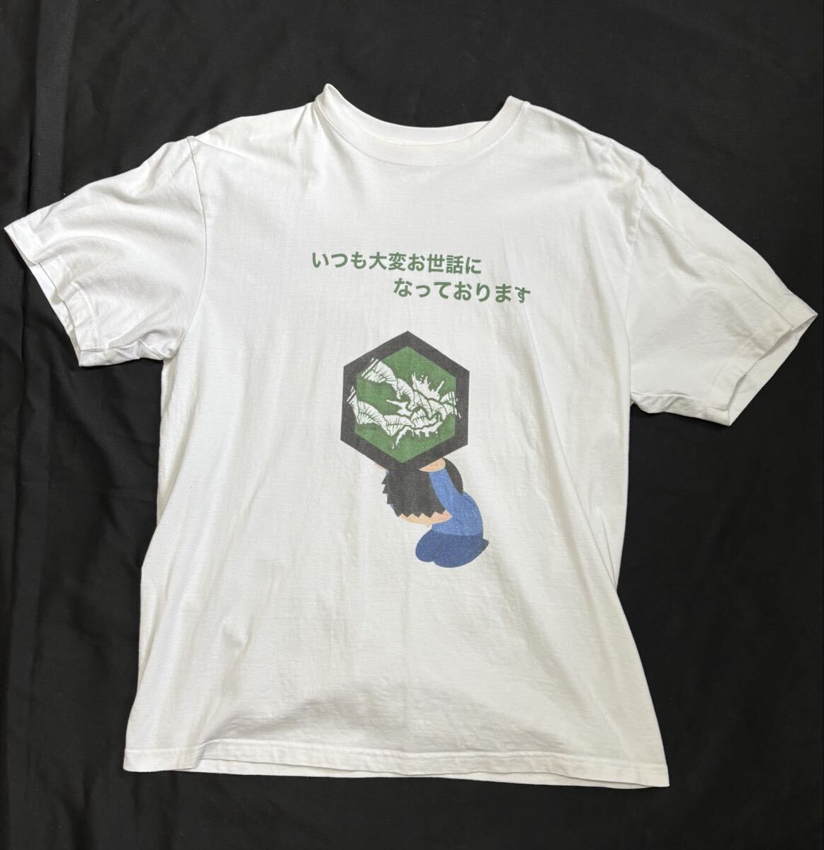 中古古着　XLサイズ半袖Tシャツ　白地に文字とイラストプリント　綿100% ユナイテッドアスレ