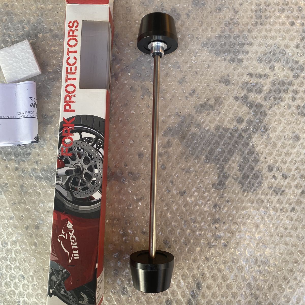 未使用品　パッケージ潰れ　TRIUMPH675 07-10 トライアンフ　フロントアクスルスライダー　NEXパフォーマンス