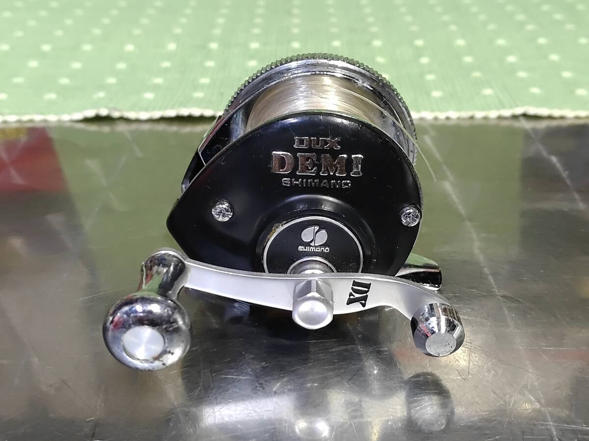 オールドモデル！SHIMANOシマノ黒色「ＤＵＸ－ＤＥＭＩ」ブラックデミAH-S日本製小型ベイトリール（中古品）魚釣りフィッシング用品