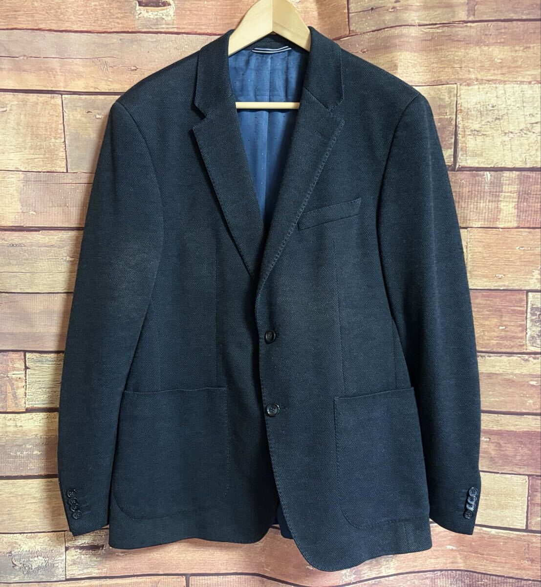 【中古】TOMMY HILFIGER ウール ？ テーラード ジャケット M〜Lサイズ 紺色 ネイビー グレー トミーヒルフィガー 2口釦 DM1110M