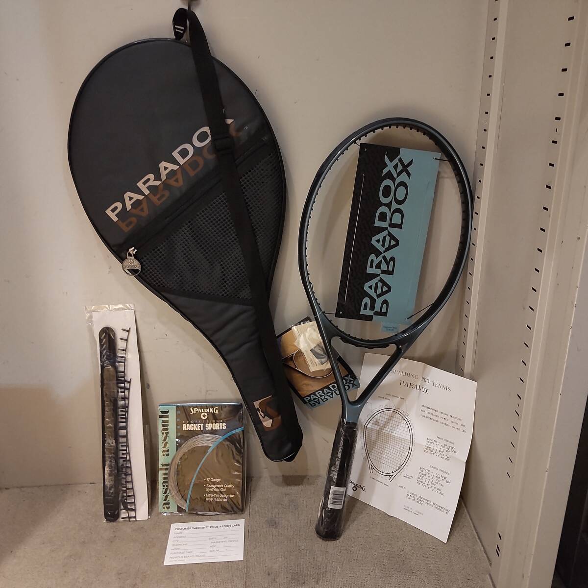 Y111313■未使用 SPALDING スポルディング テニスラケット L3, 4 3/8L ガット張り前 ドローストリング付 グリップ劣化? 長期保管品■