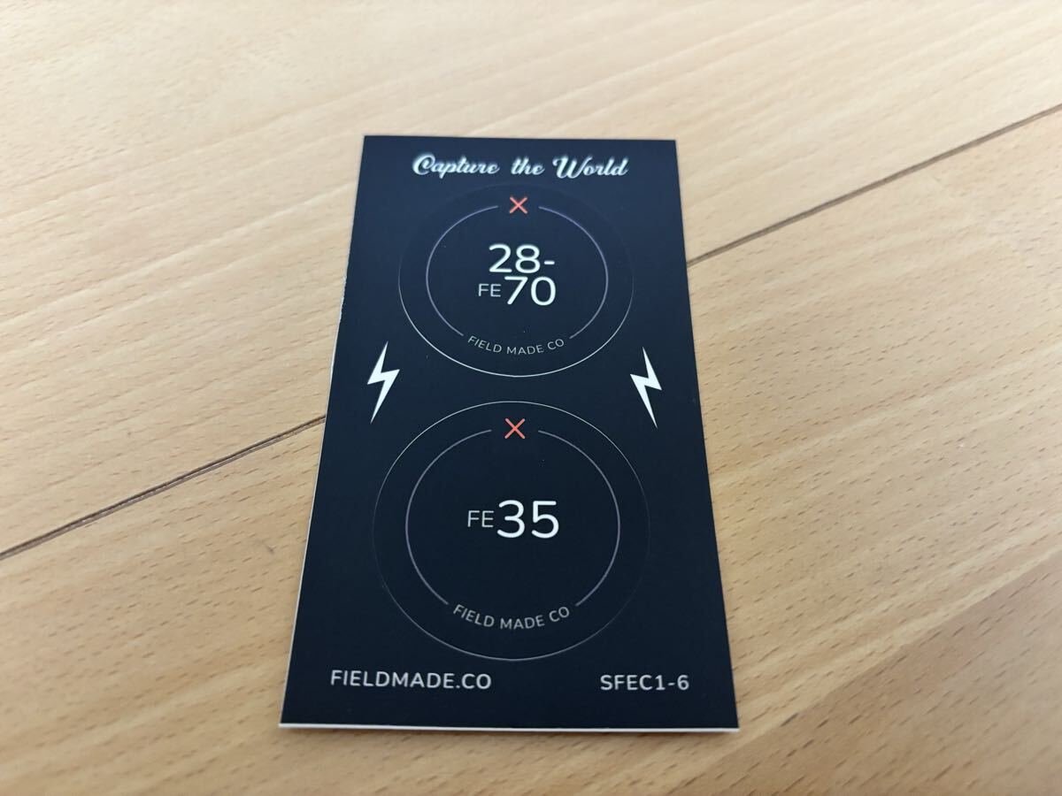 【新品未使用 / 送料無料】 FIELD MADE インジケーター ステッカー ソニー SONY FE 28−70、35 レンズキャップ用