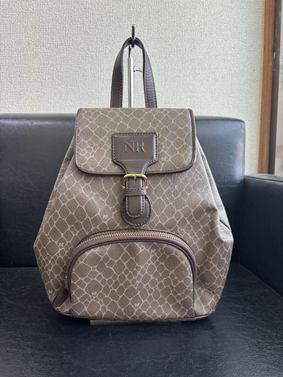 NINA RICCI ニナリッチ 総柄 ジラフ柄 レザー リュックサック ダークブラウン