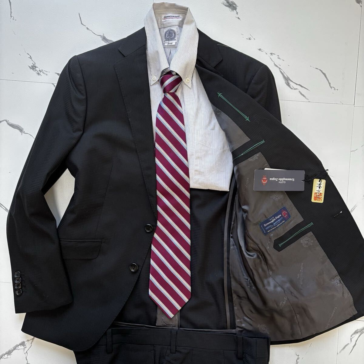 新品タグ付◎定価18万◎エルメネジルドゼニア『圧倒的高級感』Ermenegildo Zegna スーツ セットアップ 黒 チェック A4位 S相当 本水牛釦