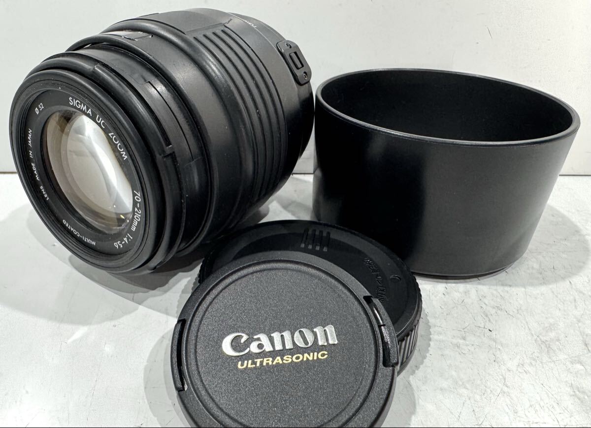 60201E☆ SIGMA UC ZOOM 70-210mm 1:4-5.6 MULTI-COATED LENS MADE IN JAPAN φ52 Canon用AFレンズ フード付 ♪配送＝宅急便(EAZY)♪
