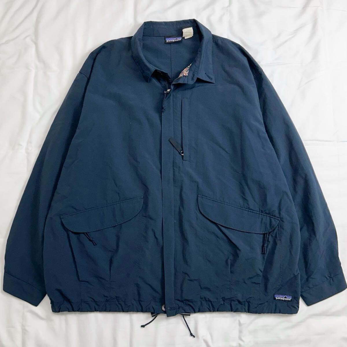 美品 XL Patagonia パタゴニア バギーズジャケット ボタニカル柄 ネイビー
