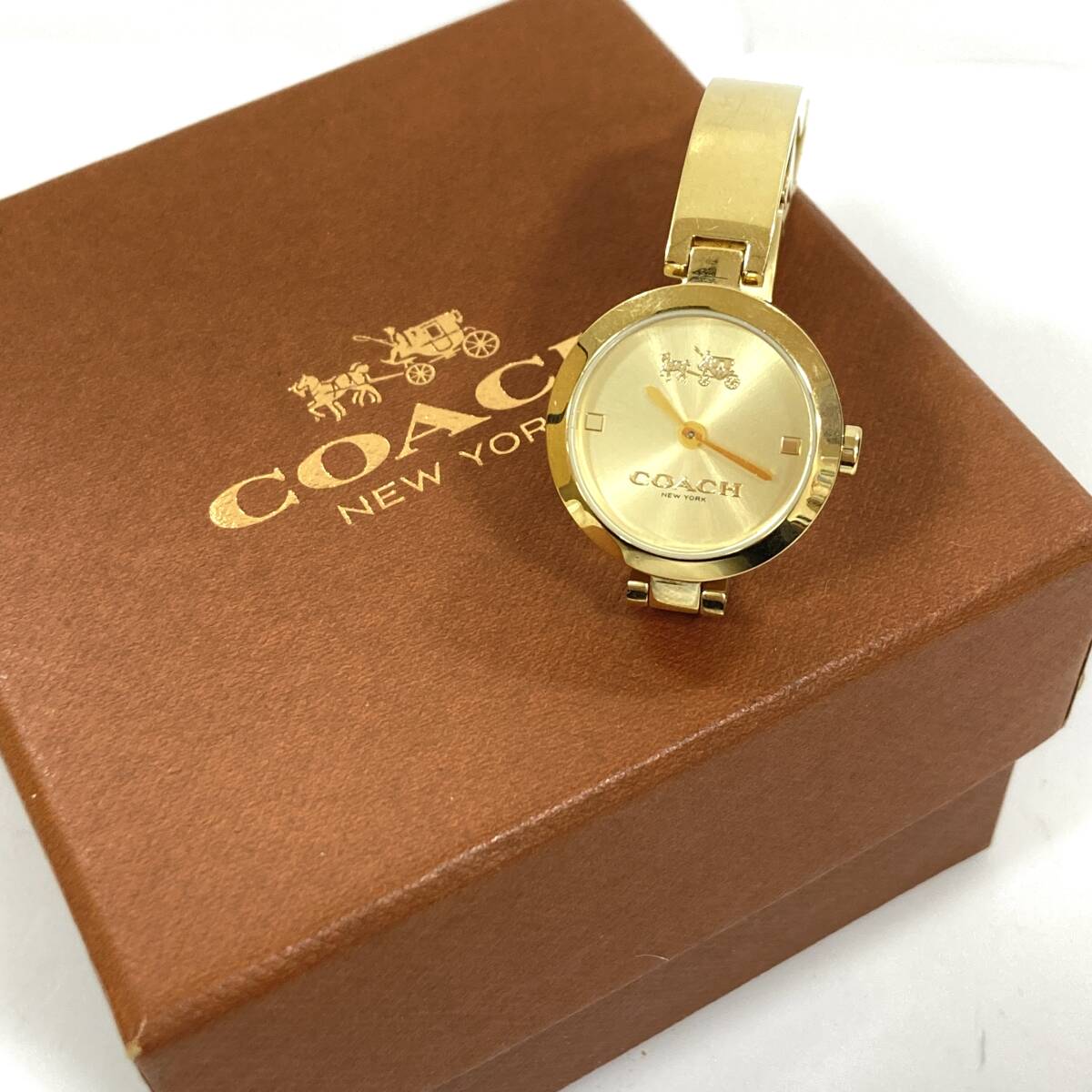 #4136 COACH コーチ NEWYORK QZ CA.92.7.34.0943 ゴールドカラー 腕時計 動作未確認 箱付き レディース