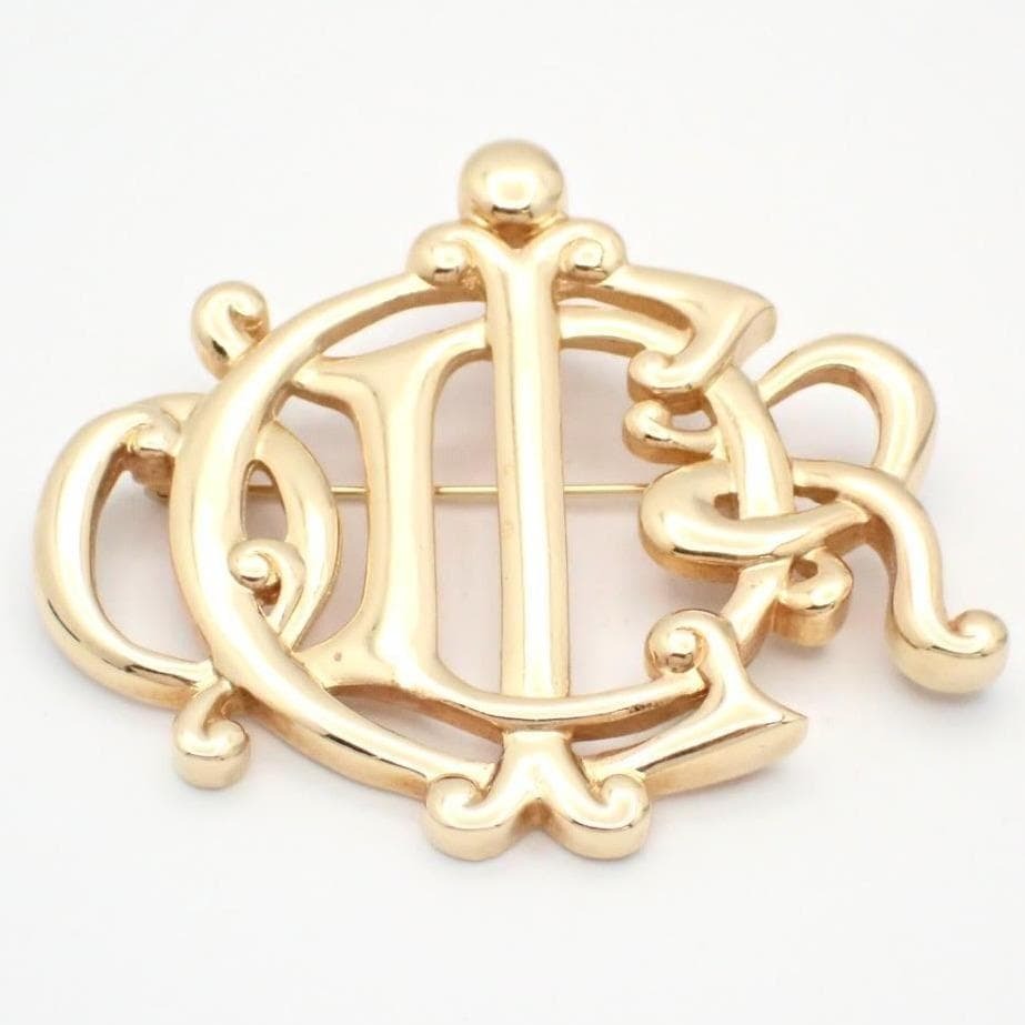 Christian Dior クリスチャンディオール ブローチ バッジ ゴールド エンブレム ロゴ 保存袋 レディース アクセサリー ブランド