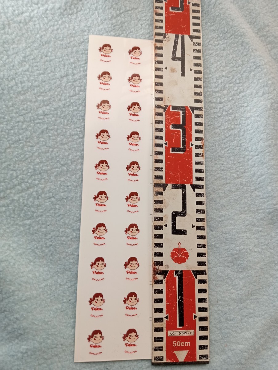 ノベルティ不二家ペコちゃん プラスチックボード白　棚