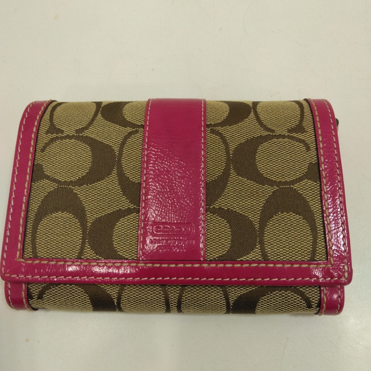 (コーチ) 2つ折り財布 シグネチャー柄 ブラウン×ピンク レザー COACH キャンバス ウォレット