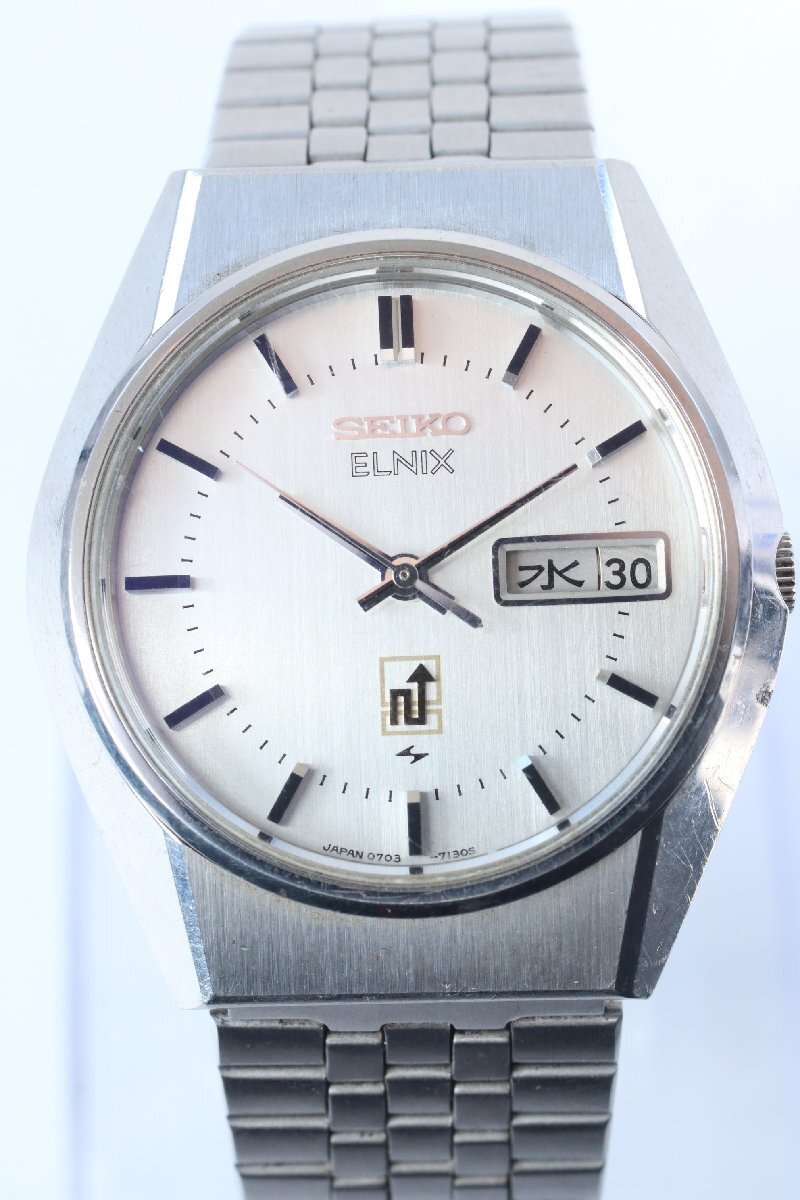 ★SEIKO セイコー ELNIX エルニクス 0703-7110 シルバー文字盤 電磁テンプ式 デイデイト メンズ 腕時計 1154-TE