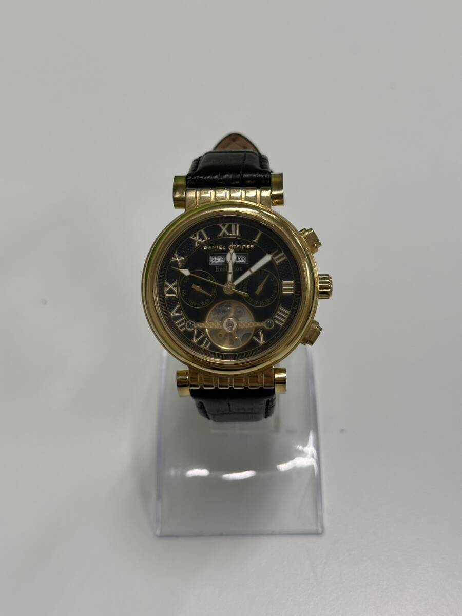 稼動品 Daniel Steiger DS2084M クロノグラフ 裏スケ 腕周り最大25cm 黒文字盤 ゴールド ダニエルシュタイガー 腕時計 中古 現状品 F4925-3