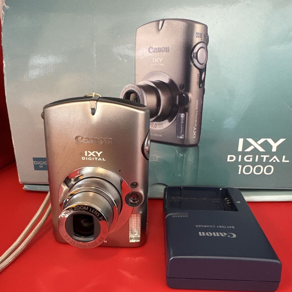 塩YA996 Canon IXY DIGITAL1000 シルバー コンパクトデジタルカメラ 元箱、説明書付